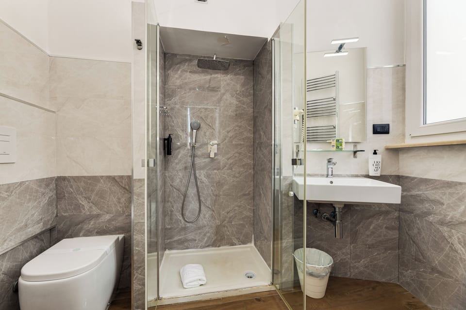 Superior Single Room, 1 Large Twin Bed, Non Smoking, City View (Small) | Bathroom | Shower, rainfall showerhead, designer toiletries, hair dryer