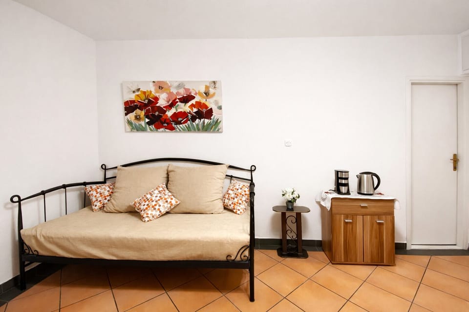 Apartment, 1 Bedroom | Living area | Flat-screen TV