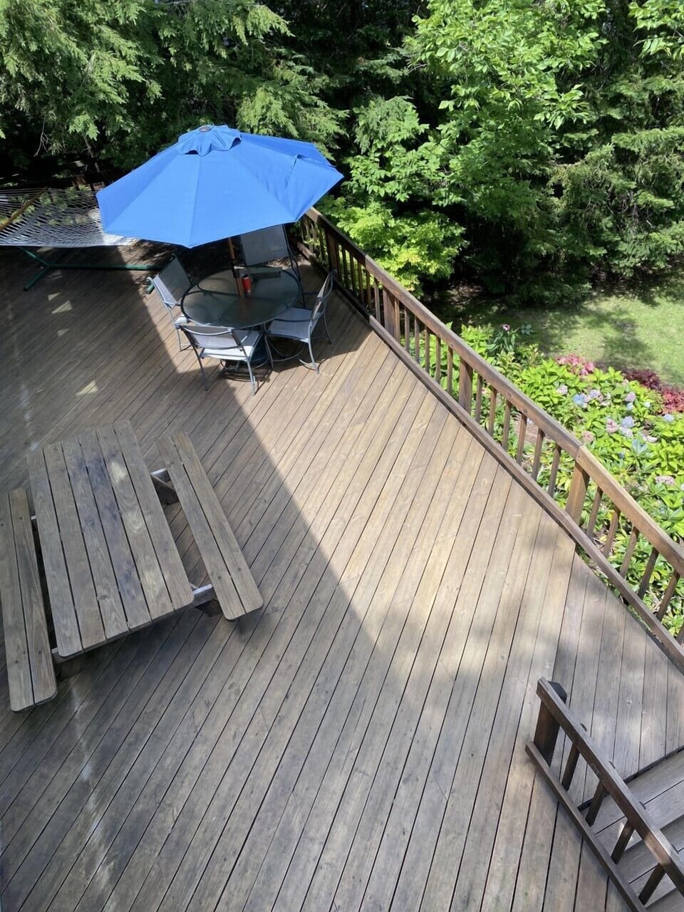 View from deck off Master Bedroom, hammock, table for 4, picnic table for 6