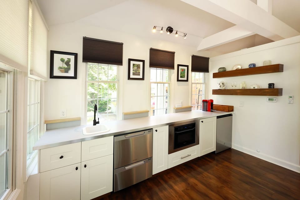 Modern kitchenette with convection microwave, fridge/freezer, drawer dishwashers