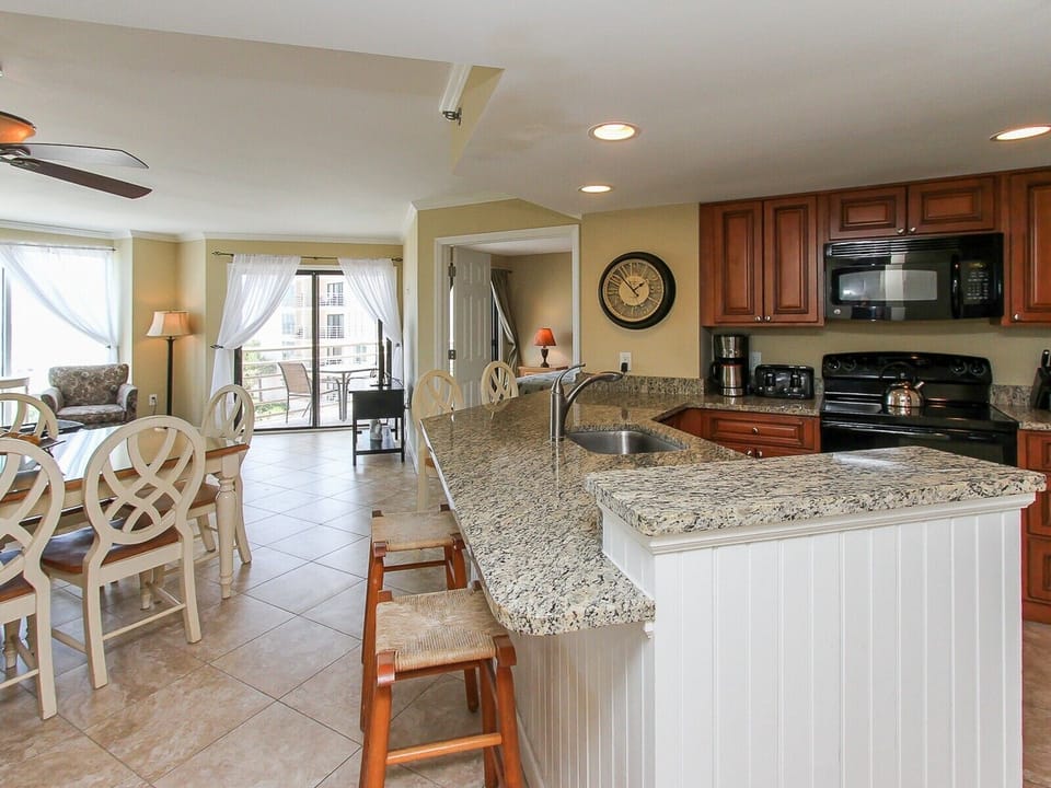 Kitchen with Breakfast Bar at 1301 Villamare