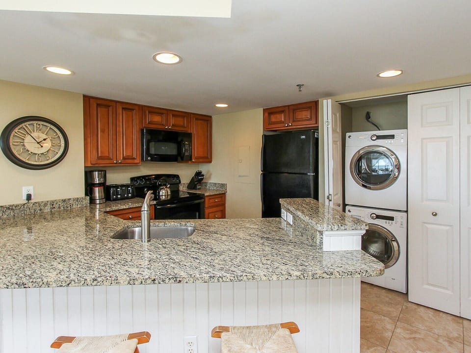 Kitchen includes the washer and dryer at 1301 Villamare