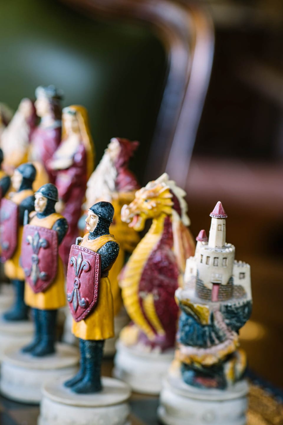 Handcrafted chess pieces add charm to the library’s cozy game corner.