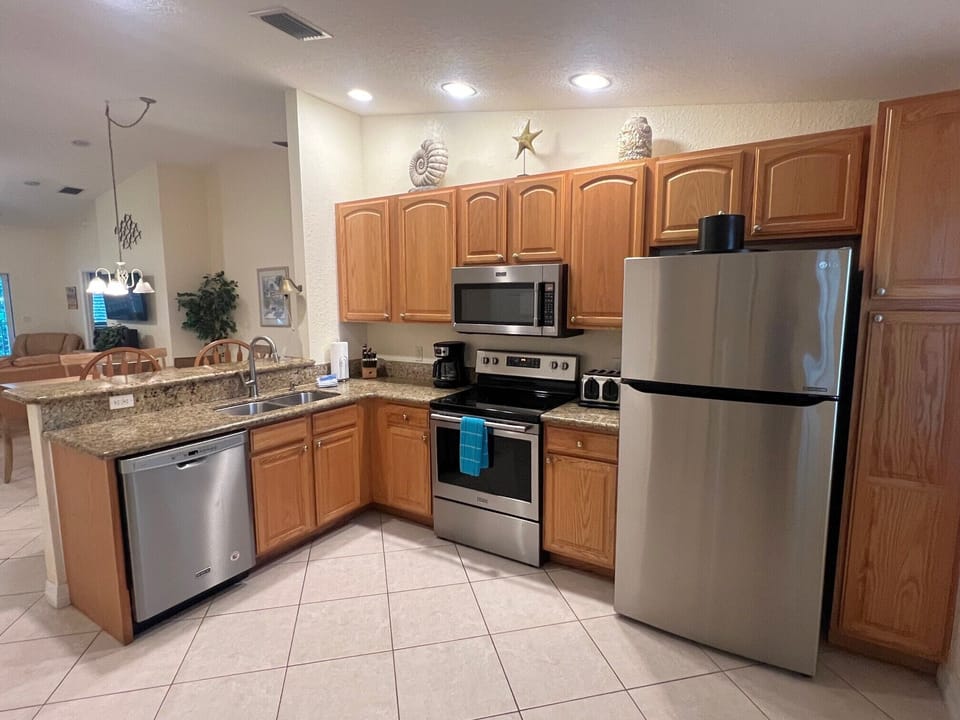 Modern Kitchen Area W/All New Stainless-Steel Appliances