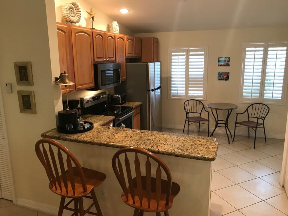 Modern Kitchen W/All Granite Countertops