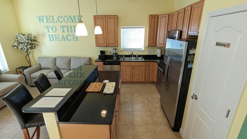 LARGE KITCHEN AREA WITH FULLY STOCKED WITH EVERYTHING YOU NEED