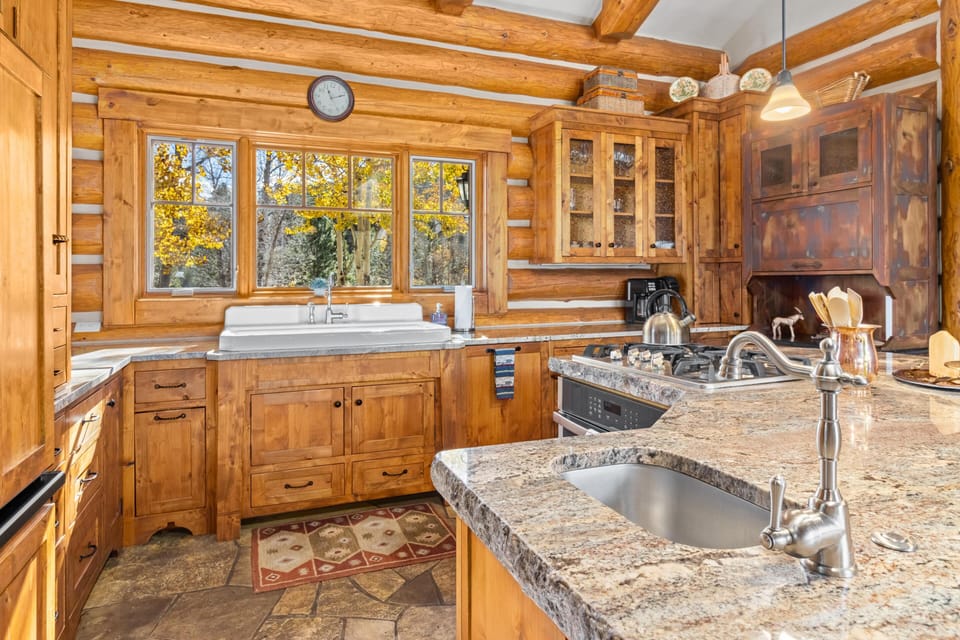 Kitchen with granite countertops and scenic window views