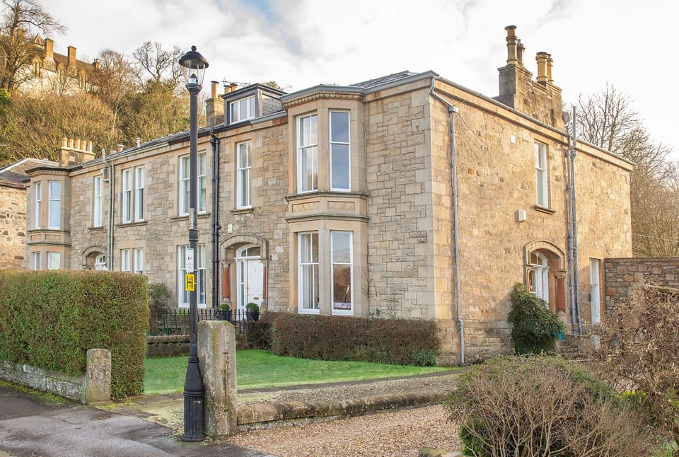 Outside of house showing larger block and driveway