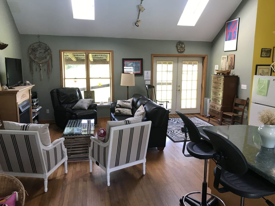Living area with satellite tv. 