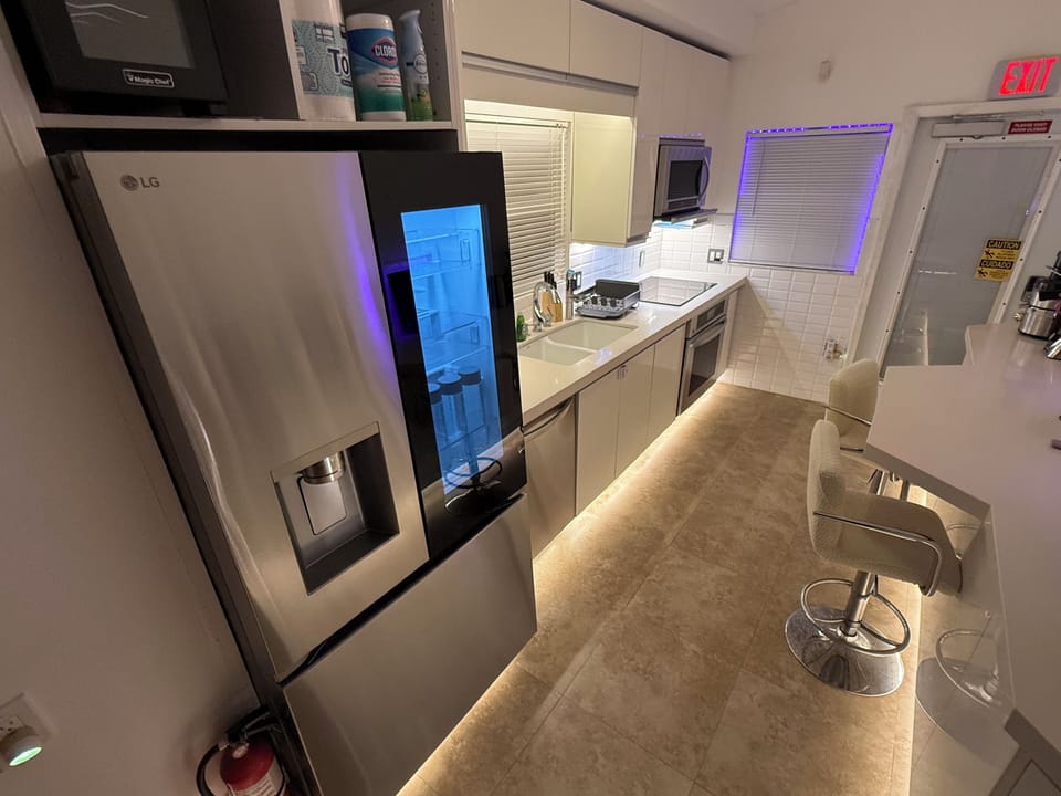 XXL Size 31 cu. ft. InstaView Smart Refrigerator Access kitchen to direct garage