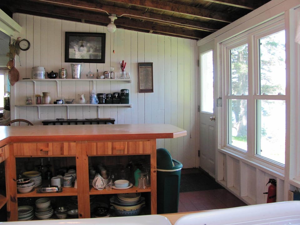  Kitchen extended counter space with stools. View of the ocean.