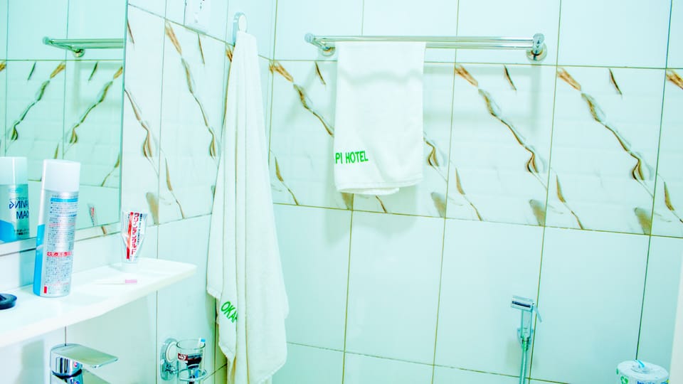 Rainfall showerhead, slippers, towels, soap