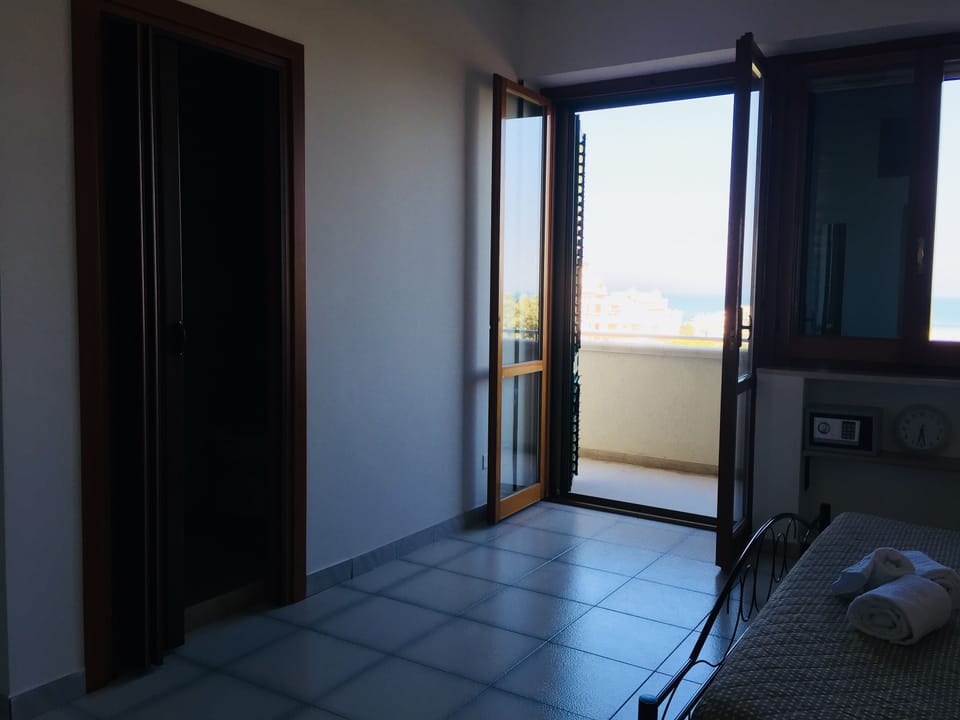 Classic Quadruple Room, Multiple Beds, Non Smoking, Sea View | Premium bedding, down comforters, in-room safe, individually decorated