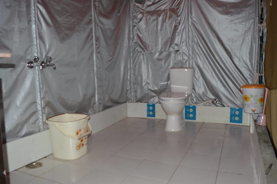 Shower, slippers, towels
