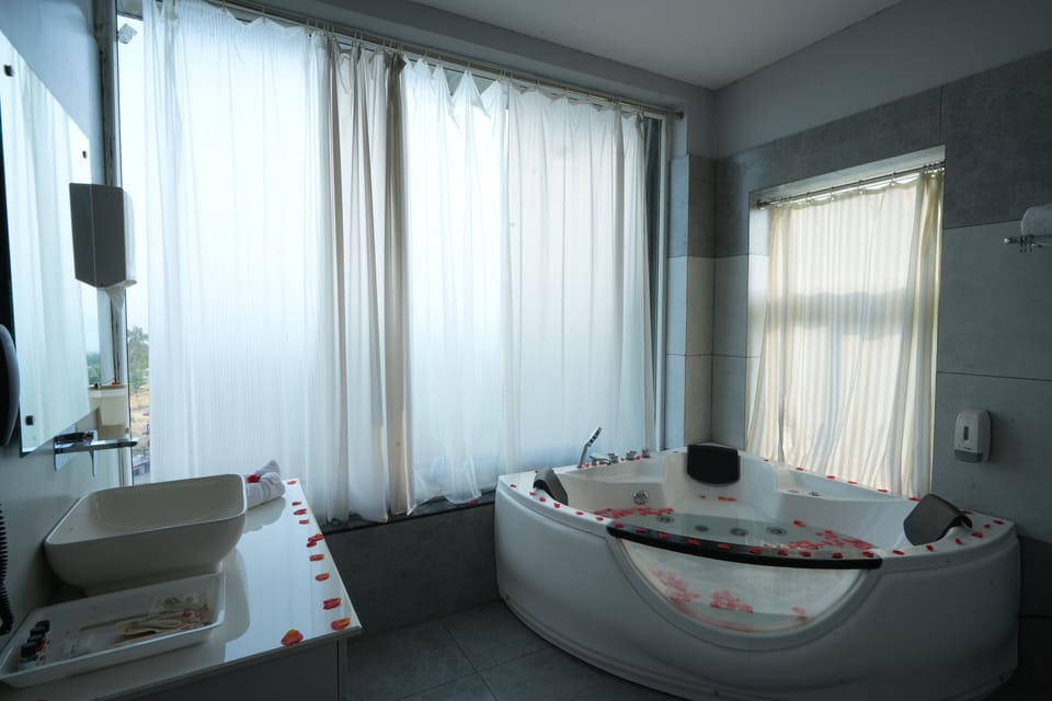 Shower, designer toiletries, hair dryer, soap
