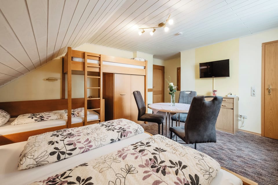 Quadruple Room, Multiple Beds, Non Smoking | Hypo-allergenic bedding, desk, blackout drapes, free WiFi