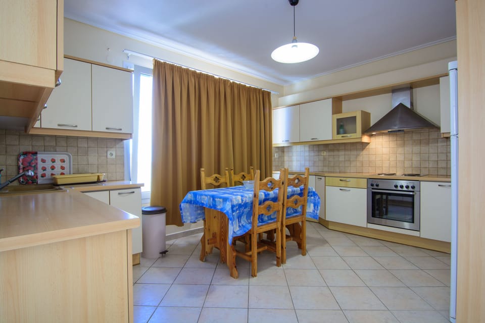 Standard Apartment, Sea View | Living area | Flat-screen TV