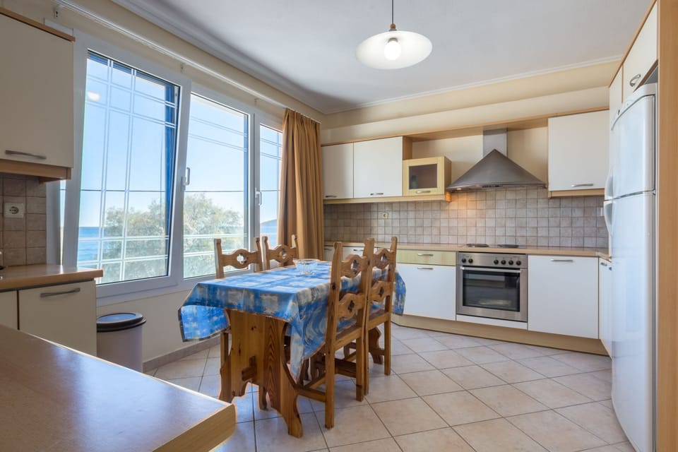 Standard Apartment, Sea View | Private kitchen | Full-size fridge, oven, stovetop, electric kettle