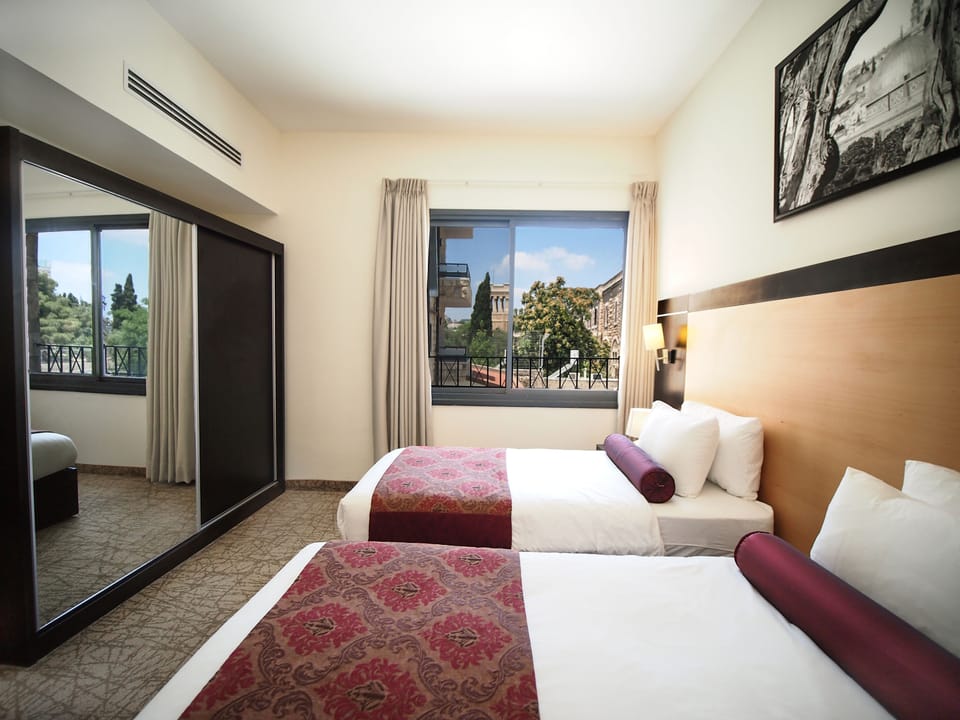 Standard Quadruple Room | In-room safe, desk, laptop workspace, soundproofing