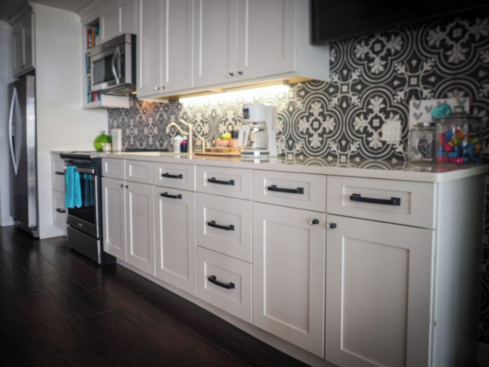 Updated kitchen full of everything you need to cook a meal.