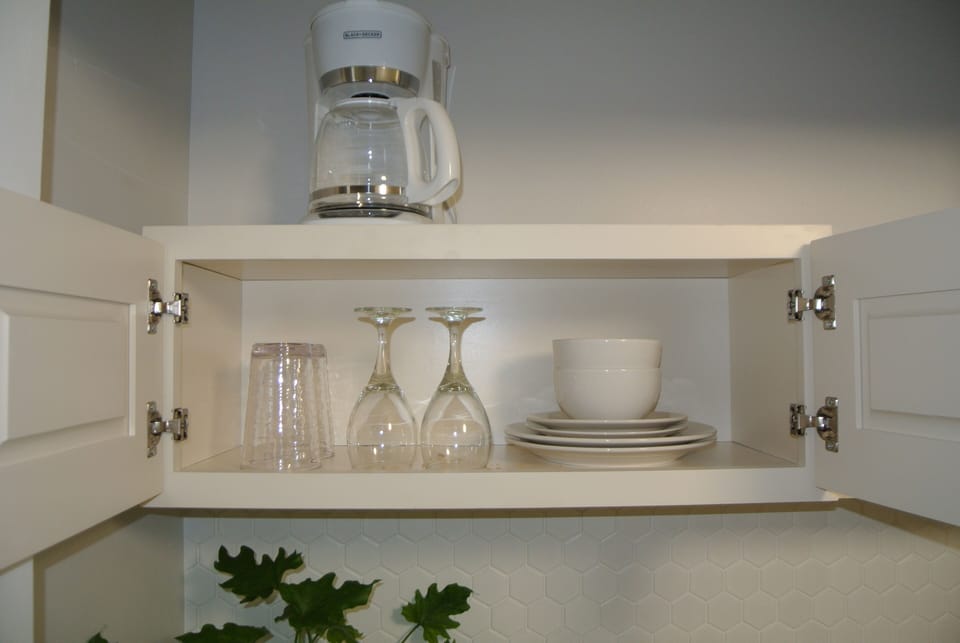 Dishes & utensils for your convenience. Kitchenette,No separate Kitchen in unit.