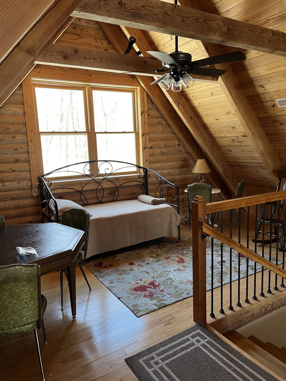 loft with game table and day bed