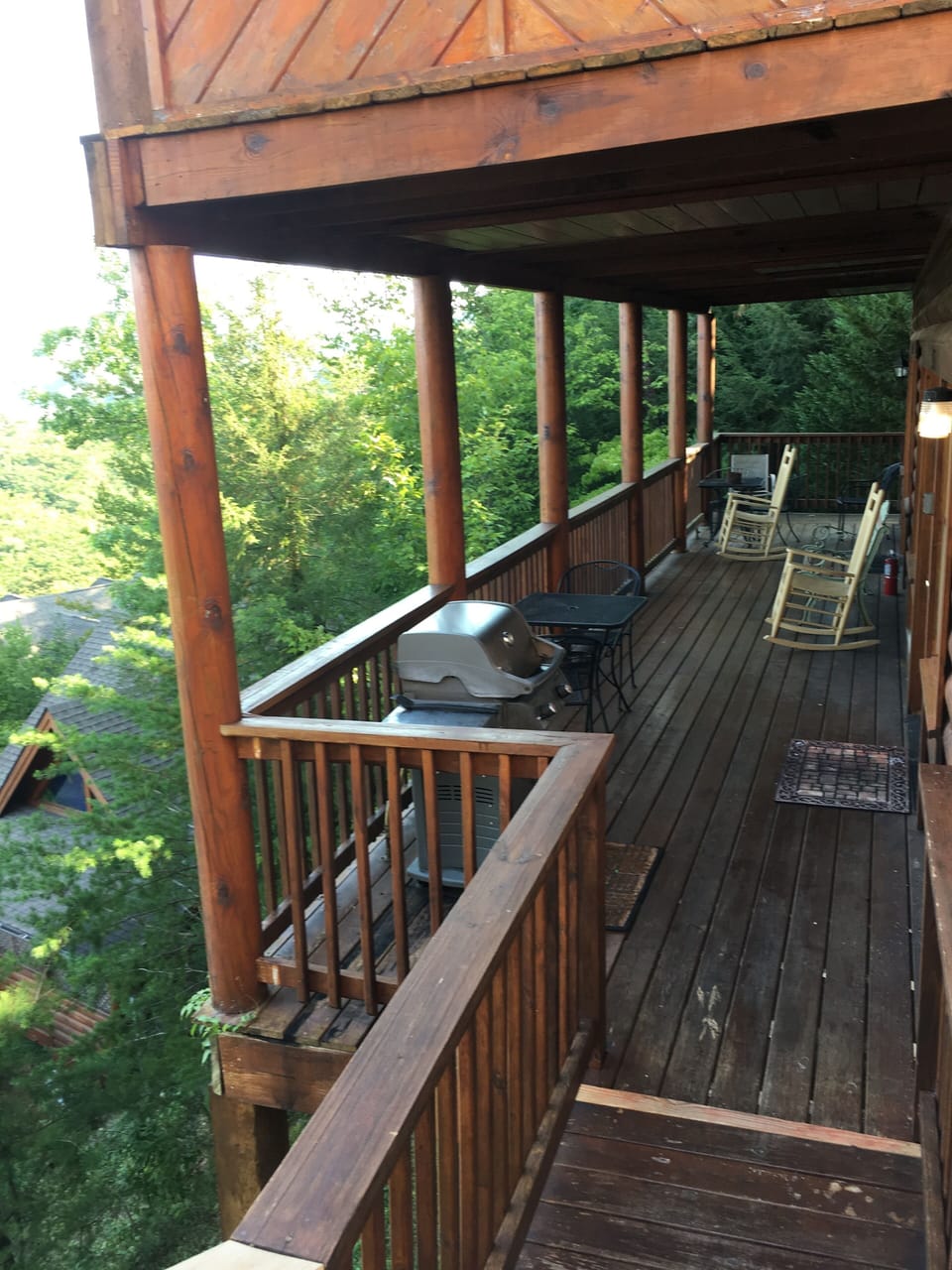 on porch: gas grill, bistro seating area