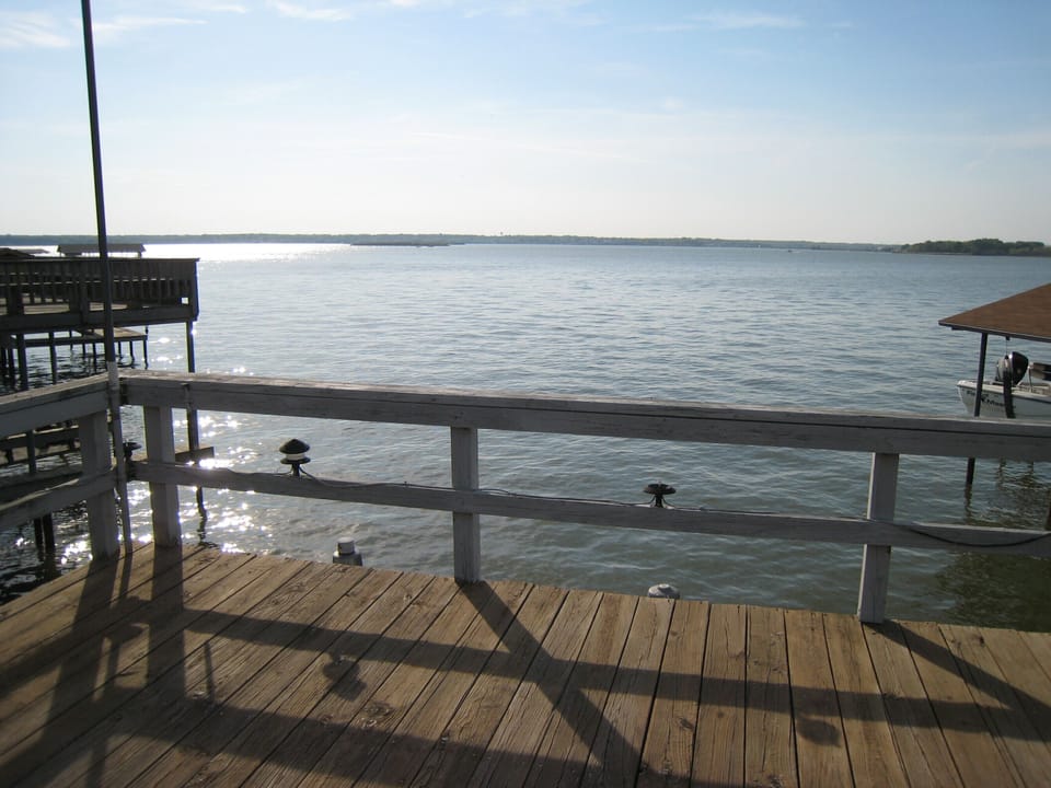 Upstairs party deck of boathouse is great for sunbathing or watching the sun set