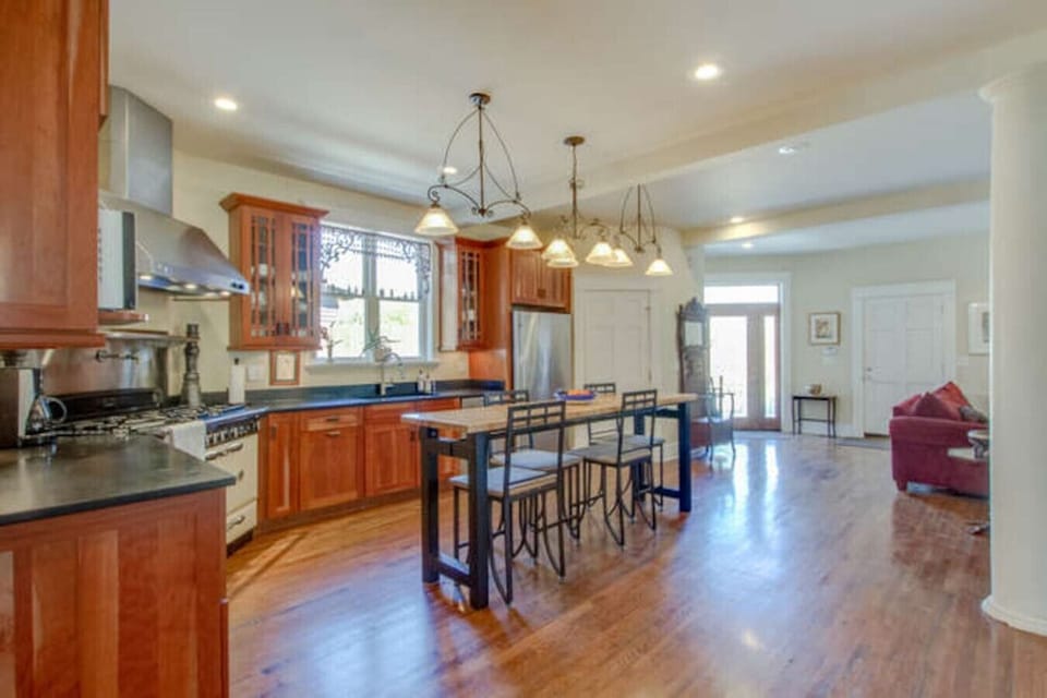 Hallway with hardwood floors and architectural details