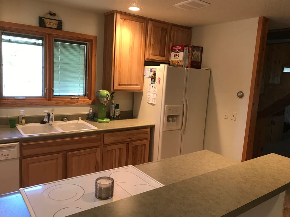 Side by side fridge and soda maker
