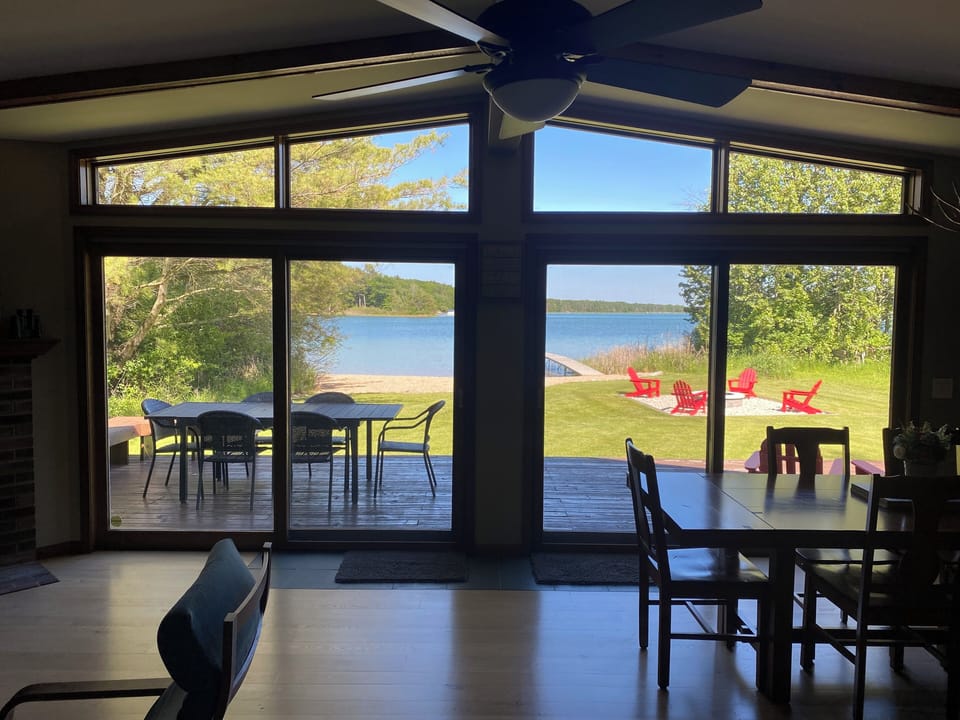 Great Views from Kitchen/Living/Dining.  Large Sliders with Full Screens. 