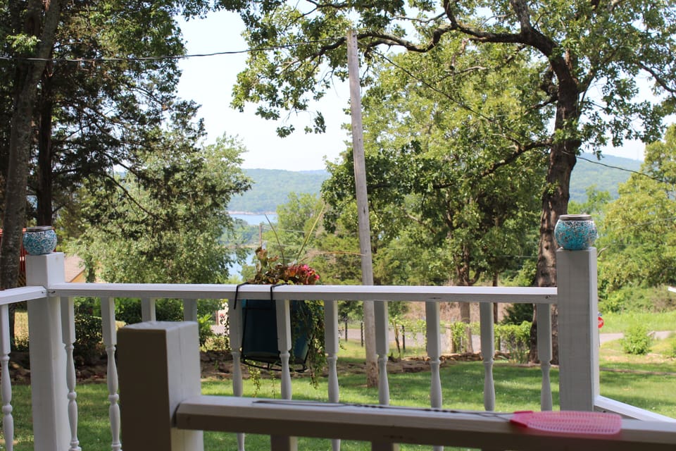 Lake view from downstairs porch where you can hear the sounds from the lake!