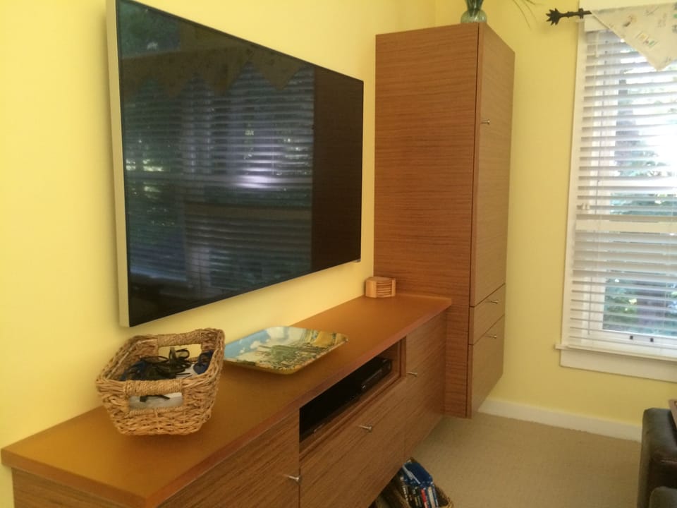 Entertainment Center and 54 inch, HiDef TV with 3D Capability and Comcast