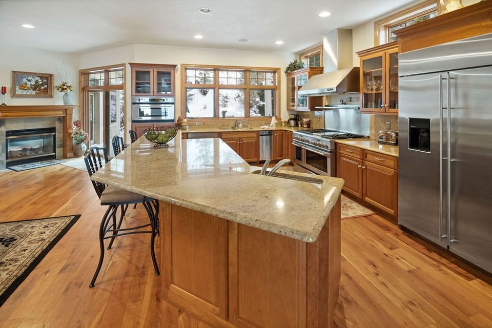 1st floor kitchen - looking at sliding door to back deck (grill/outdoor seating)