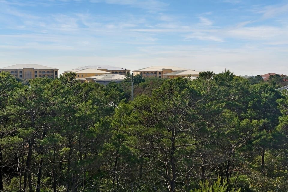The view from the covered porch with distant beach view