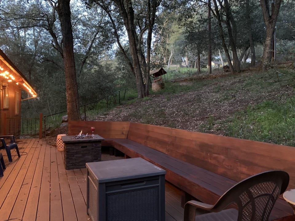 fire pit seating on the back deck off the kitchen