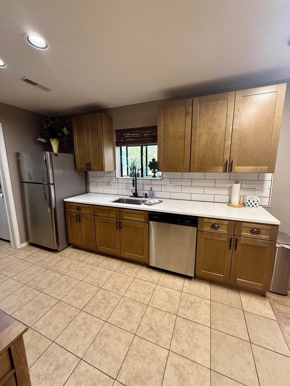 Stainless steel appliances and quartz countertops give you a lovely kitchen!