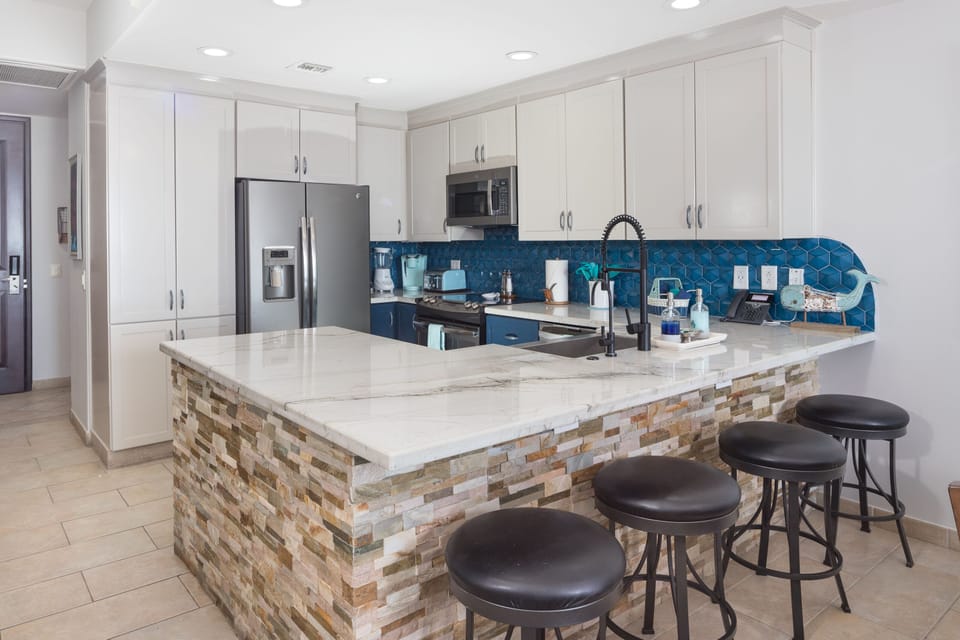 Fully stocked kitchen with high end appliances