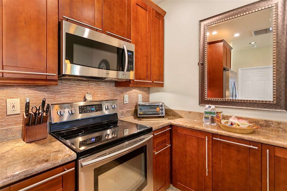 Full sized stainless steel appliances. 