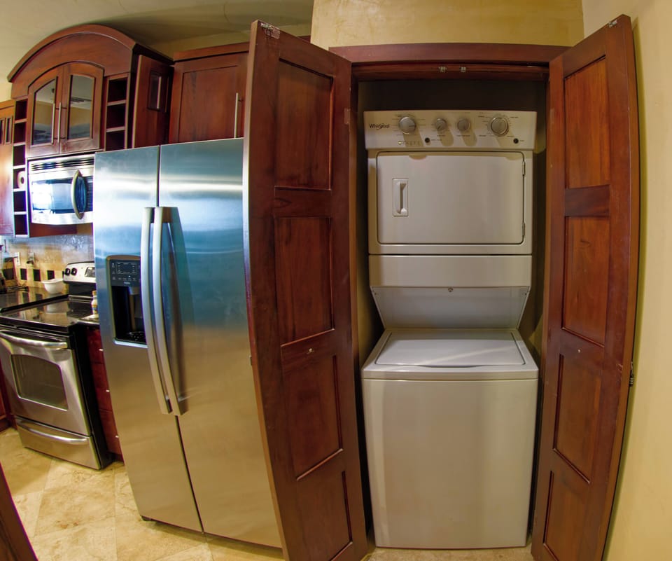 Washer/dryer (combo 369/370).  Line dry on bathroom hooks & lines for fastest. 