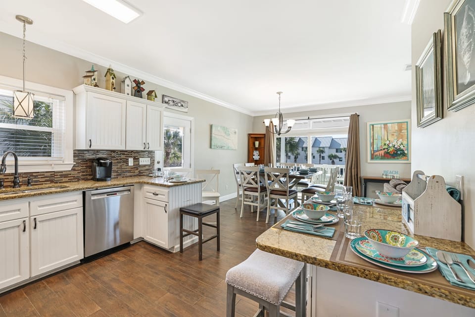 Main Kitchen area includes seating for 4 at the bar.
