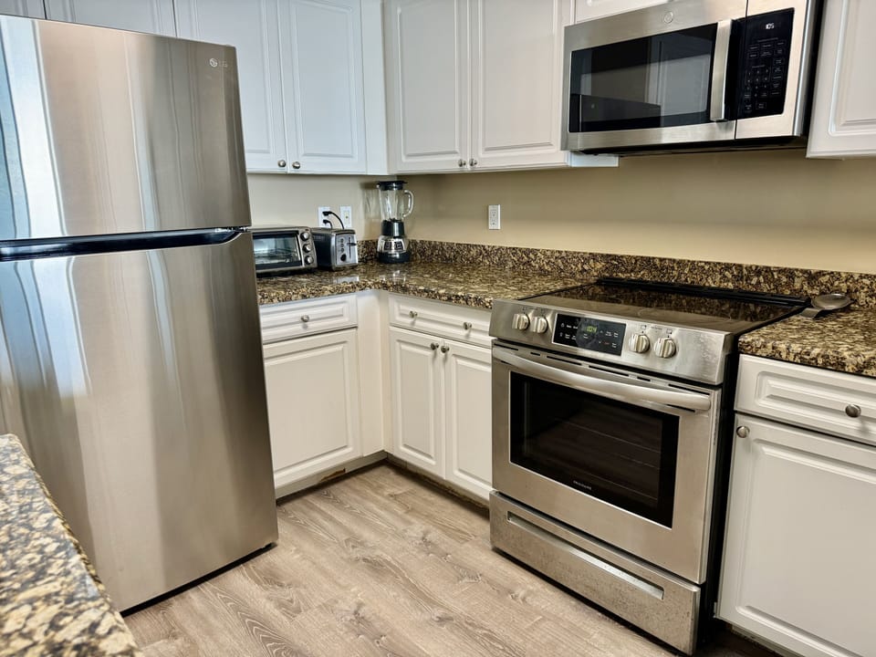 Upgraded kitchen with new stainless steel appliances 