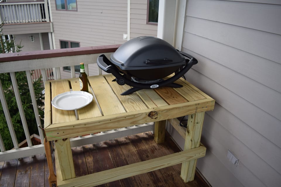 Grilling on the deck is easy with this very efficient Weber grill.
