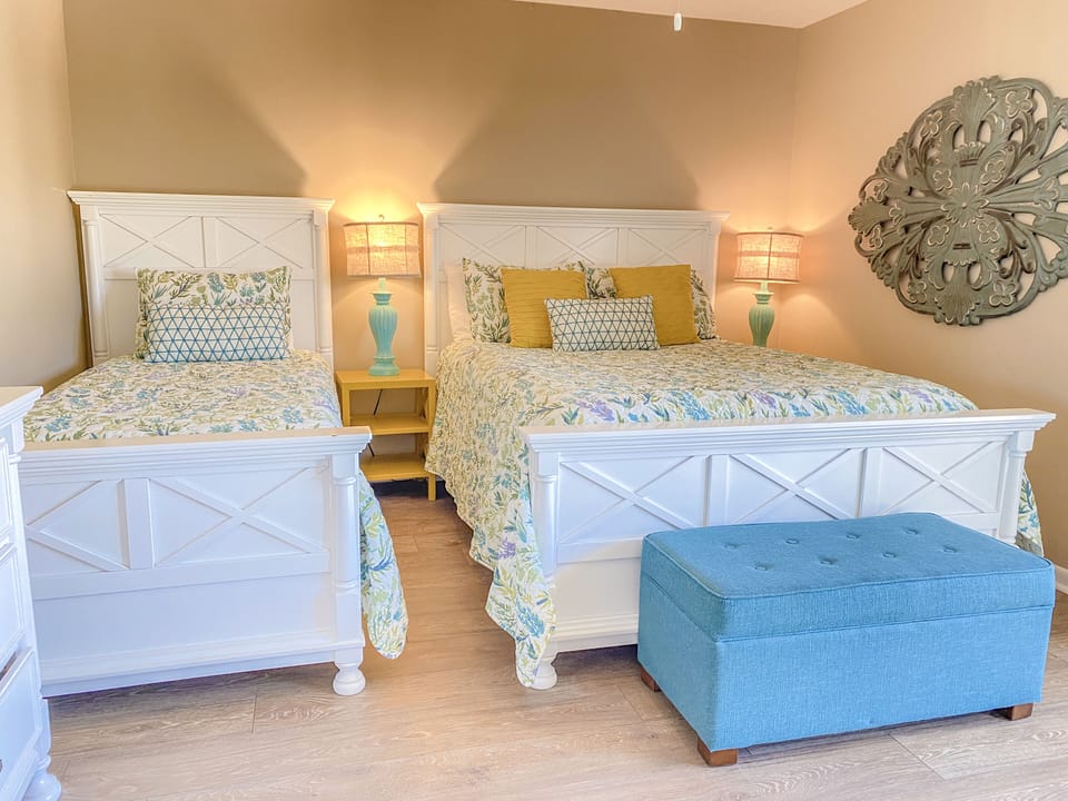 Second bedroom with twin & queen beds