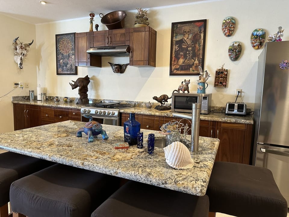 The kitchen island with it's own bar sink is perfect for entertaining.