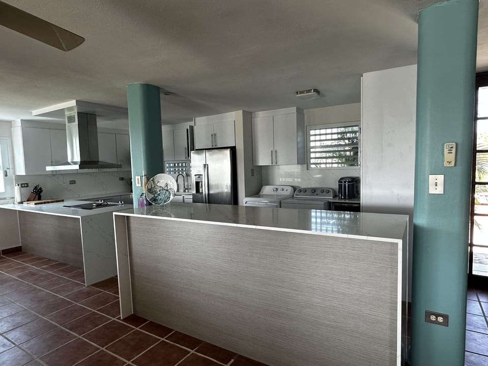 Newly renovated kitchen/laundry area May 2023