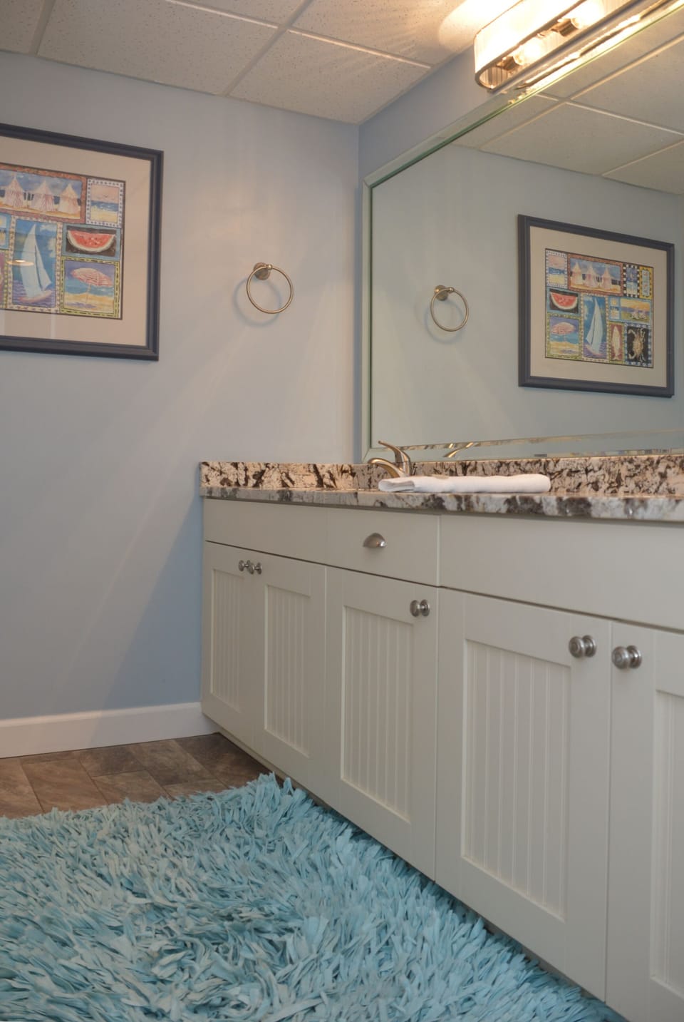 Dual sinks in master with new cabinets, granite counters and new tile flooring!!