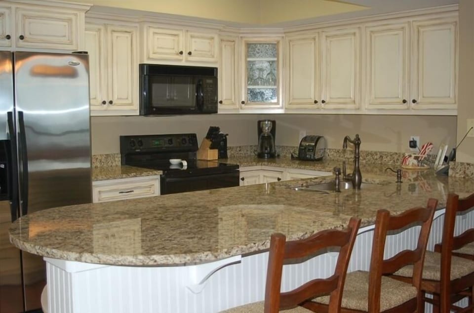 brand new just renovated - new distressed cabinets and granite countertops