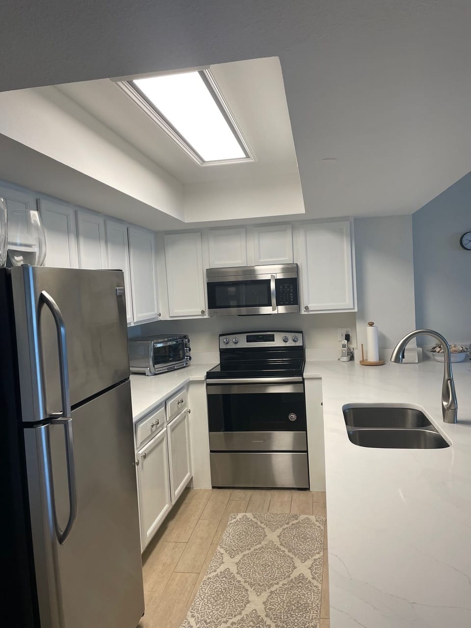 Kitchen with Quartz counter tops and Stainless Steel Appliances 