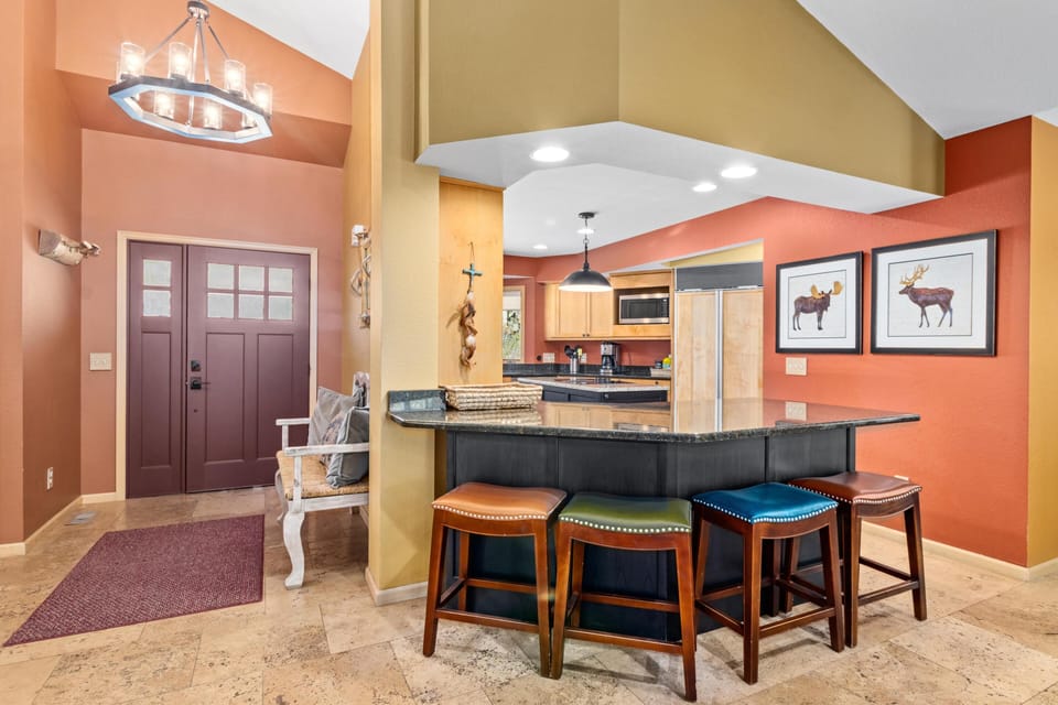 Warm, open kitchen with breakfast bar